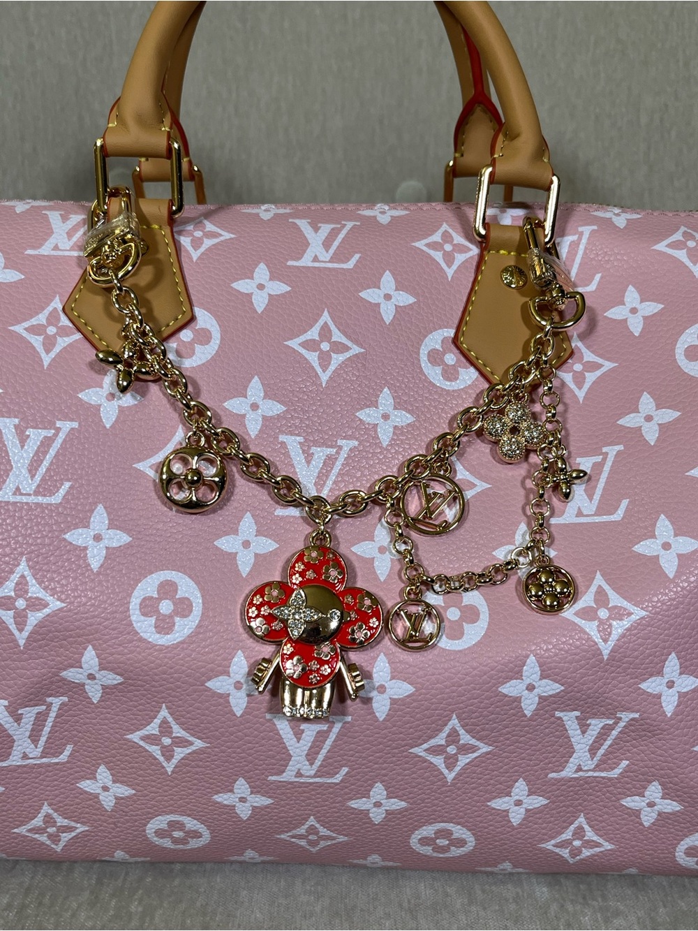 Louis Vuitton Pink Monogram Satchel with Gold Charm Chain